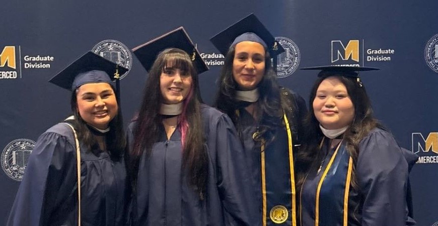 Felicia Cruz Fernandez, Faith Her, Natalie Moreno, and Catherine Rivera Hernandez at graduation